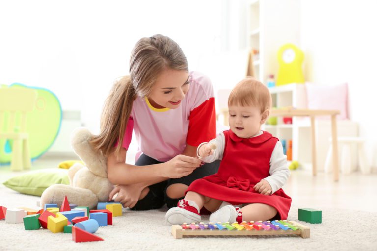 Caring nanny with children in Islamabad